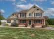 Front view of 113 Country Lane Richland PA with spacious yard and inviting curb appeal